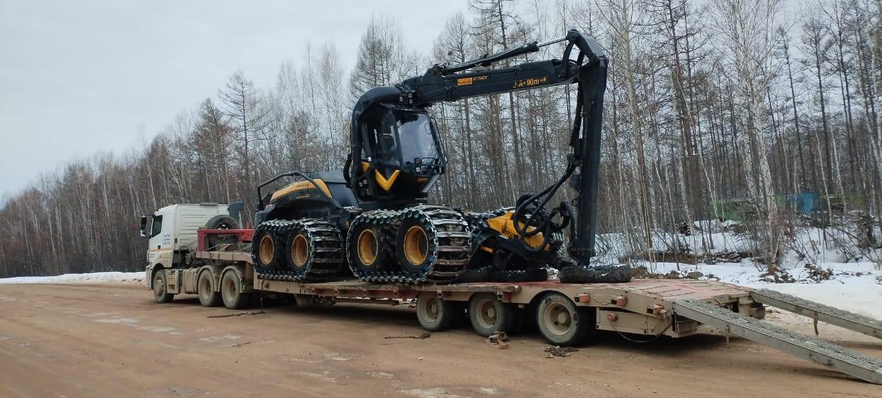 Транспортировка харвестера на трале
