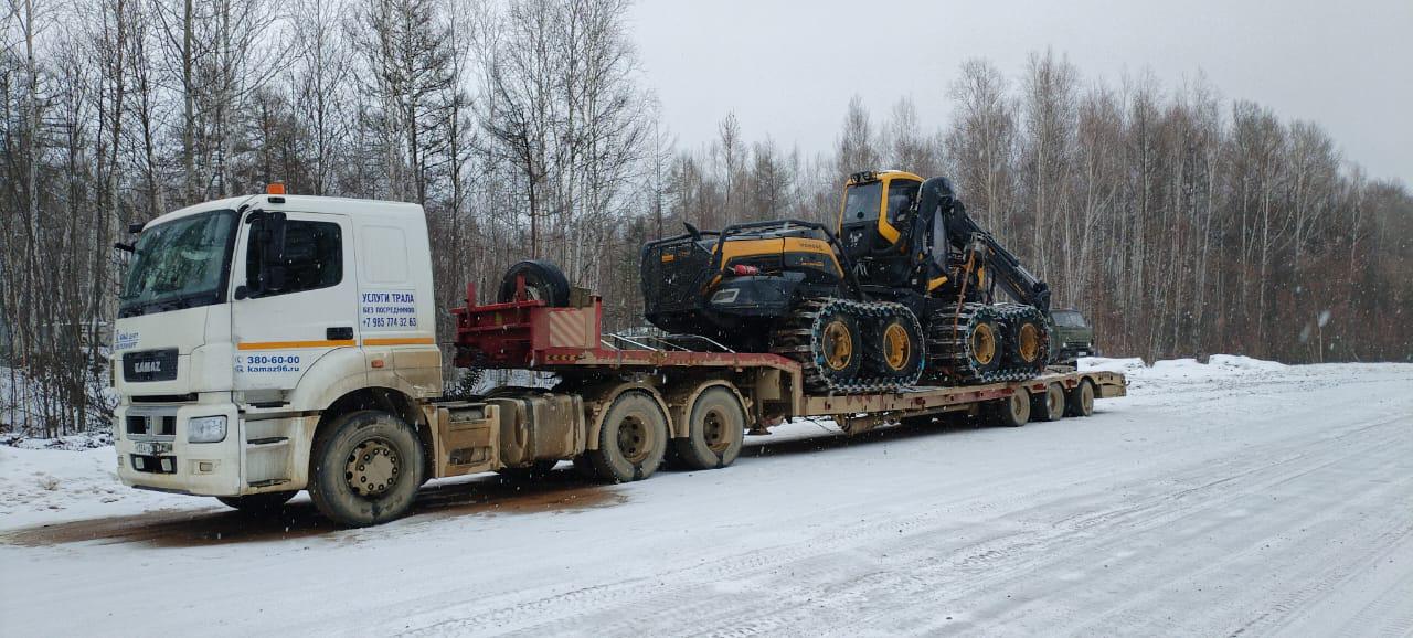 Перевозка харвестера тралом